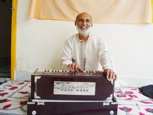 Pradeep plays Harmonium
